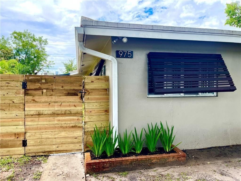 Photo of 975 NE 40th Street #A, Oakland Park, FL 33334 (MLS # F10551342)