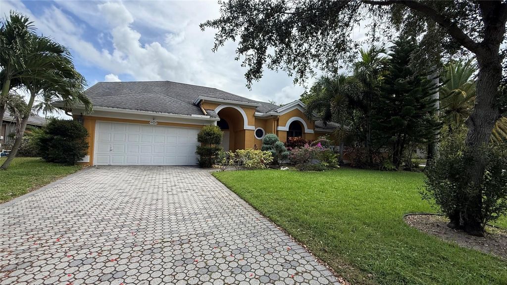 Photo of 4424 NW 52nd St, Coconut Creek, FL 33073 (MLS # F10511613)