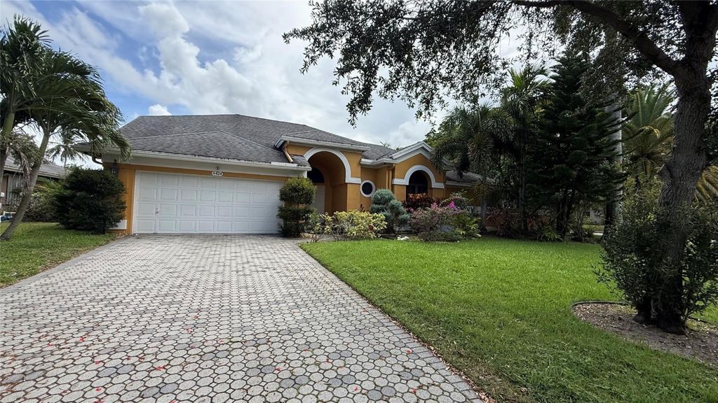 Photo of 4424 NW 52nd Street, Coconut Creek, FL 33073 (MLS # F10511613)