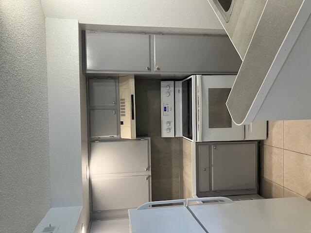 1st floor, tiled unit, very Nice Gated Community Located in the Heart of Palm Beach lakes, close to shopping centers and 5 mins from Downtown West Palm. Equal Housing Opportunity.