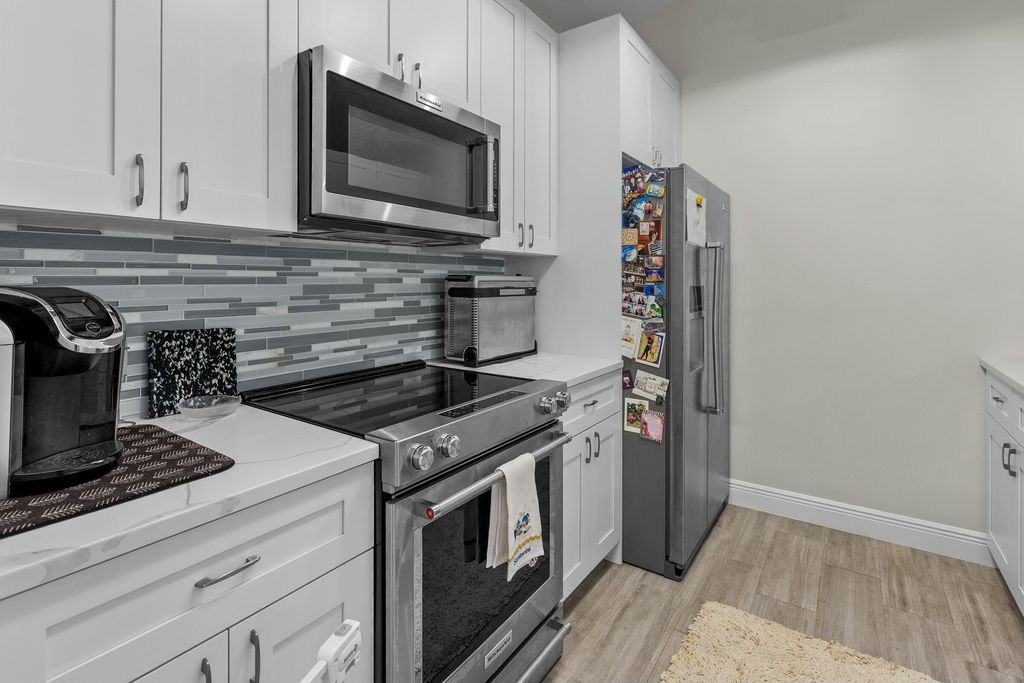 Photo of 3 Camden Lane, Boynton Beach, FL 33426 (MLS # R11069434)