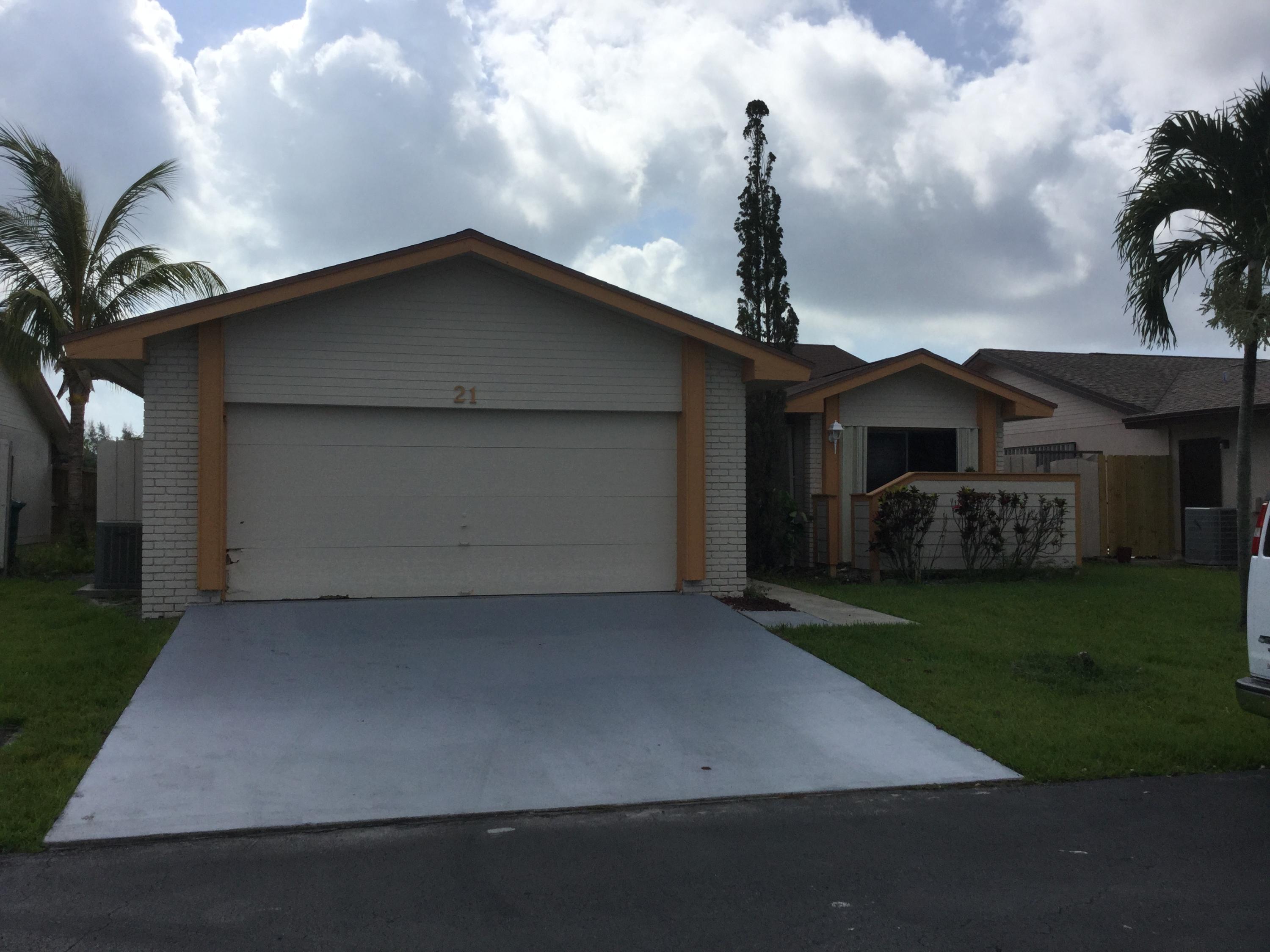 TOTALLY RENOVATED FROM TOP TO BOTTOM and DIRECT LAKE VIEW in desirable SINGLE FAMILY HOME section of Boynton Lakes!! Everything is NEW! Beautiful wood- laminate flooring throughout! New modern shaker-style kitchen cabinets with granite countertops, stainless steel appliances, new bathrooms with tile and new vanities, fresh paint both inside and out! Rare 4 bedroom model (currently 3 full bed+1 office/den) 2 car attached garage, and a spectacular direct water views