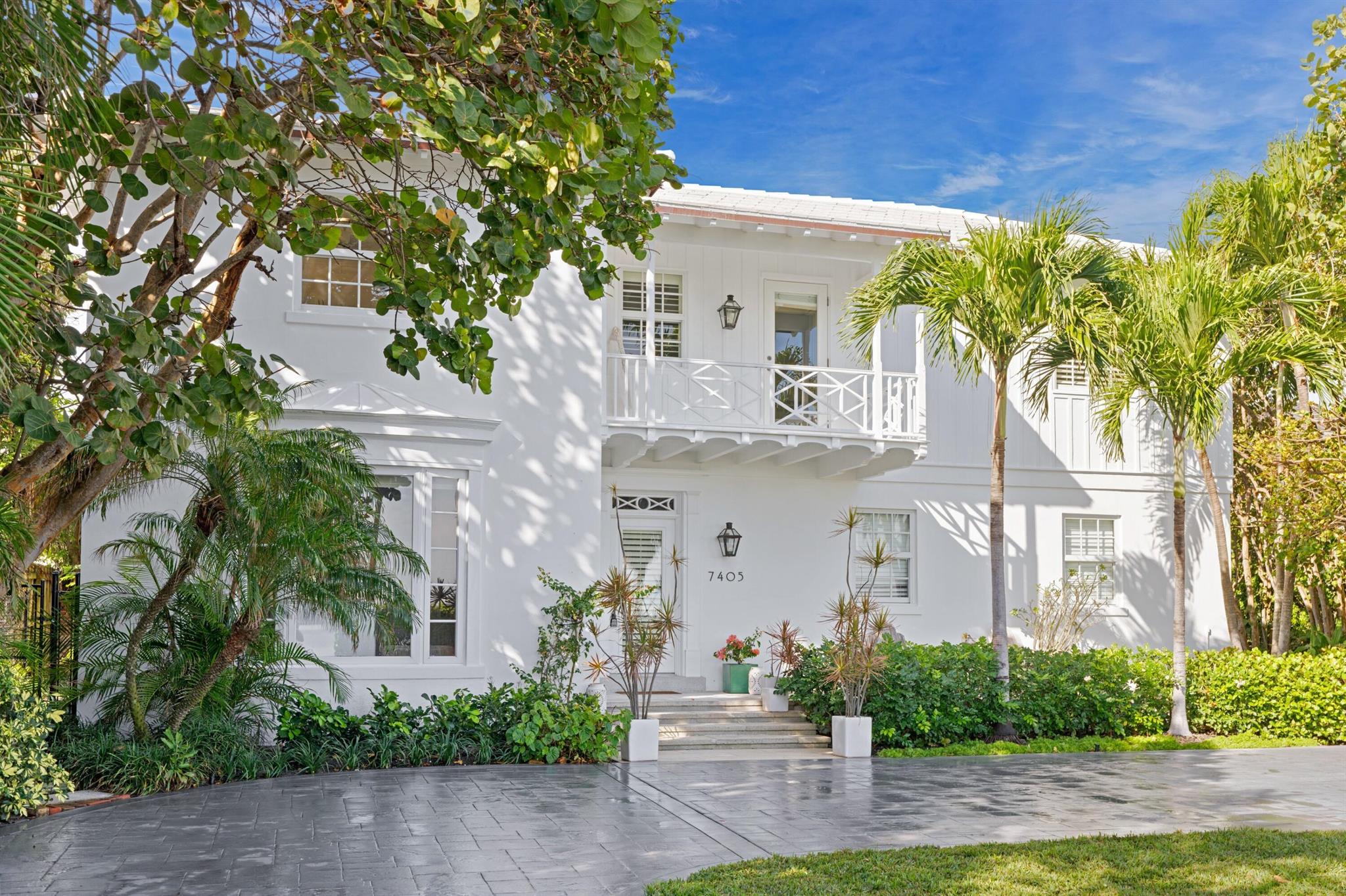 A waterfront sanctuary in the very desirable SOSO neighborhood on the quietest end of S Flagler. This beautiful Bermuda style home located directly on Summa beach is move-in ready, with various opportunities for growth and expansion. The property is situated on an oversized lot with 79 feet of waterfront views. The home offers 4 bedrooms and 3 baths, a chef's kitchen and gas range, eat in kitchen, water filtration and sound system, fully impact windows and doors, oversized loggia and outdoor dining area, pool and lush landscaping throughout. The home was completely gut renovated in 2015 and recently updated in 2023 with a new roof, balcony, and pool heater. With gorgeous views of Palm Beach Island, and permitted plans and construction costs included for a new dock, SEE MORE: