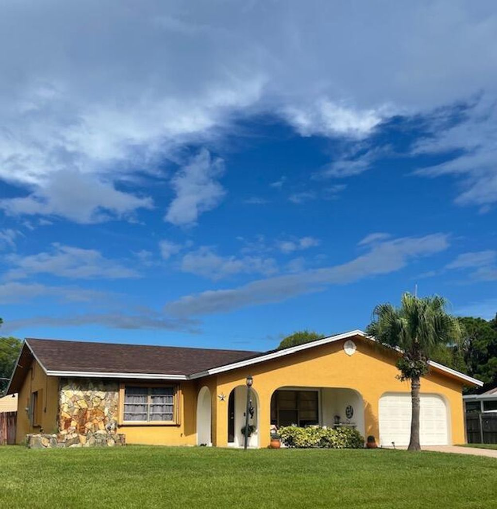 Photo of 5911 Balsam Drive, Fort Pierce, FL 34982 (MLS # R10738848)
