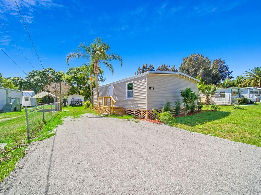 Photo of 1774 SW College Street, Stuart, FL 34997 (MLS # R10784354)