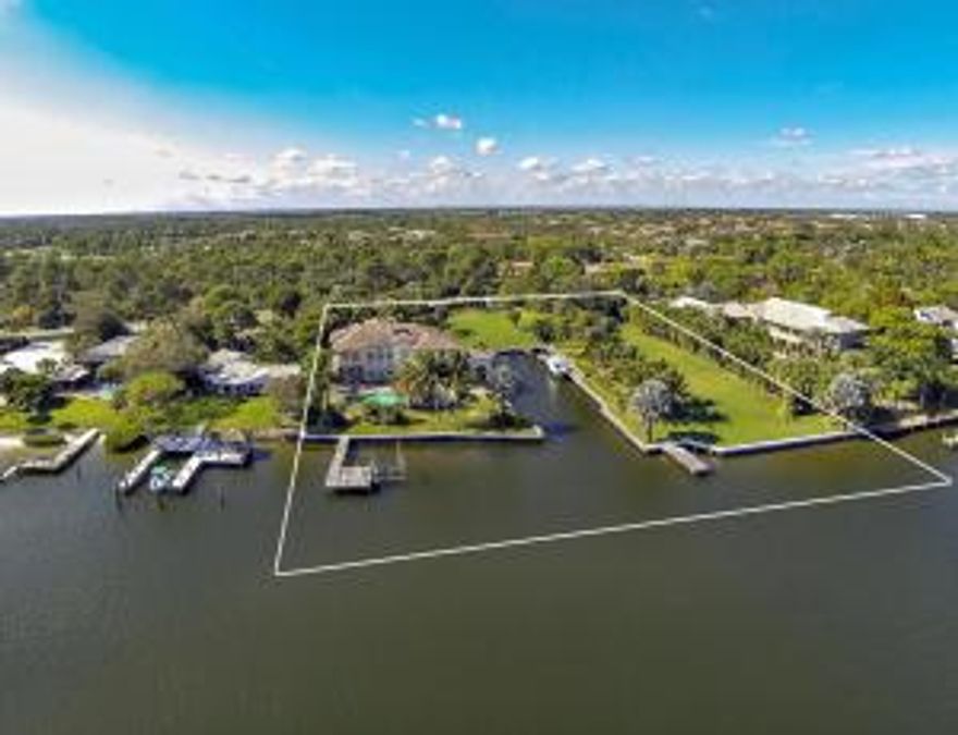 Prominent waterfront estate offering over 2 acres of direct Intracoastal Waterway property and over 300’ of frontage.  Private yacht basin on property will accommodate a 100’+ motor yacht in addition to secondary dock.  The sprawling estate property offers two vacant land parcels which could be built upon or kept as serene private grounds (4 total parcels included in this property).  The main house is situated on the southern most portion of the property and offers in excess of 9,000 sq ft of sheer architectural perfection.  One of the most substantial rear elevations seen from the waterway which is only minutes to the Atlantic Ocean.  Tucked away behind the private entry gates, this property is located in one of the most desirable locations in Palm Beach County; extremely exclusive yet only minutes to worth Avenue and 5-star dining.  Literally around the corner from exclusive clubs such as The Bear's Club, Trump National Jupiter and Frenchman's Creek, this boaters paradise offers the best of all worlds.  Must see the property to appreciate.