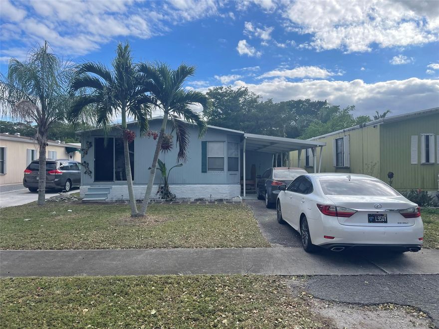 True handyman - but, ready to make it your own - - 2/2 double wide with carport - -shed - -needs TLC - but priced for quick sale - buyer must pay a $2,500 Capital Contribution fee to the assoc. at closing - low maintenance fees - ($70 month) -
