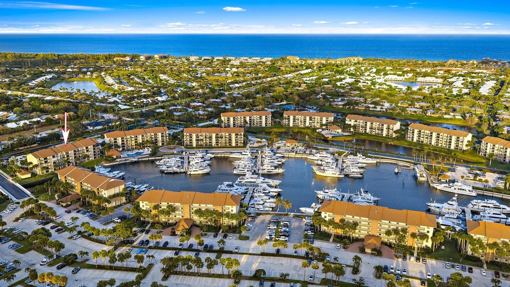 Photo of 1601 Marina Isle Way #106, Jupiter, FL 33477 (MLS # R11168243)