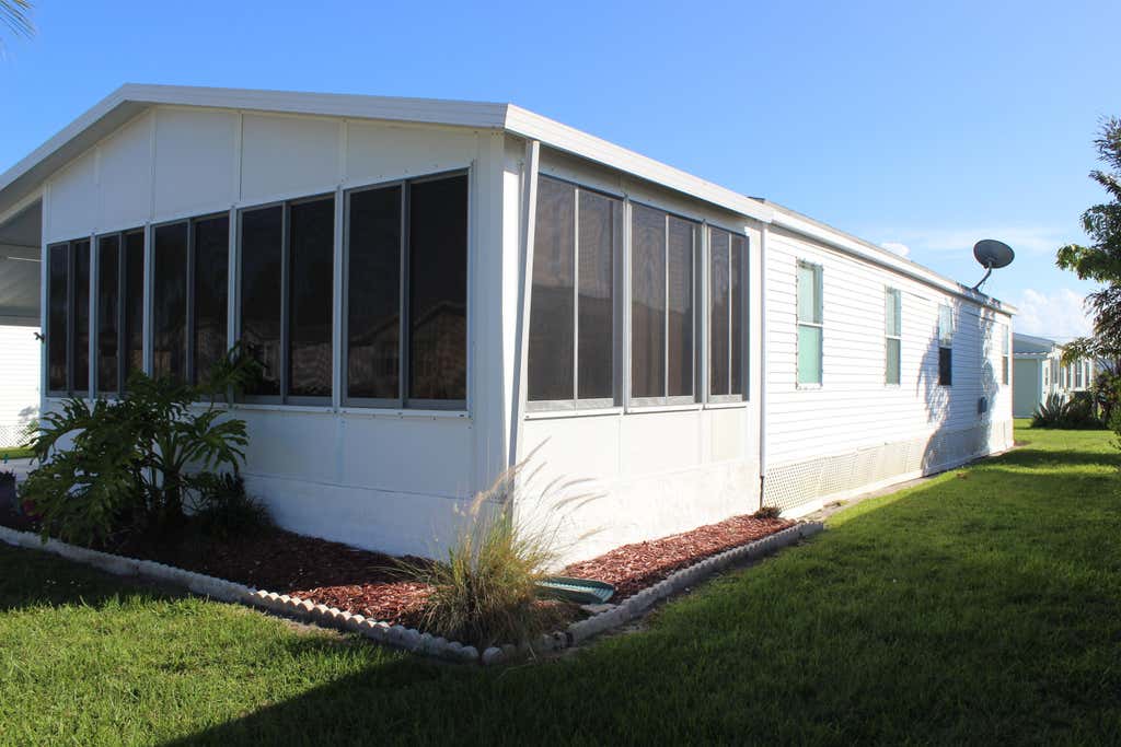 Photo of 6731 Sinsonte Court, Fort Pierce, FL 34951 (MLS # B26043286)