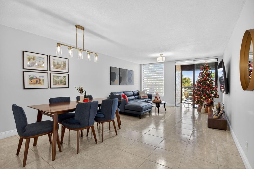 Beautiful move in ready 2 bedroom, 2 bath unit in an amazing location! Freshly painted, with renovated kitchen and new cabinets, crown molding, baseboards, and tile floor throughout. Screened patio, Hurricane shutters. Community pool and club house. Good for investors! Special Assessment $294 monthly for 12 years.