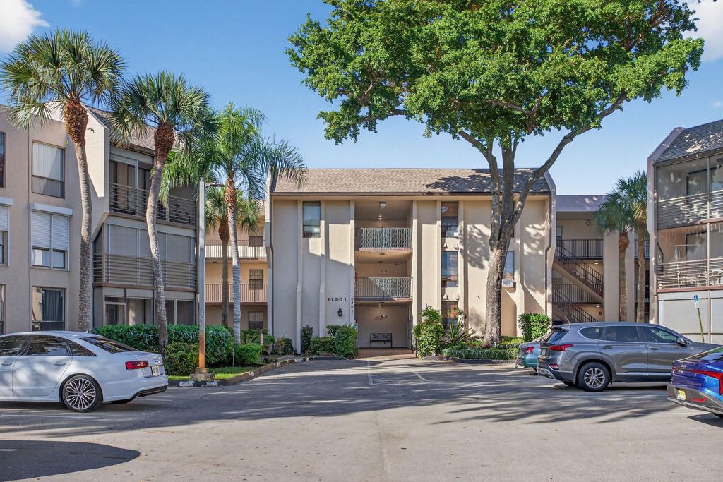 Photo of 6301 N University Drive #319, Tamarac, FL 33321 (MLS # F10424492)