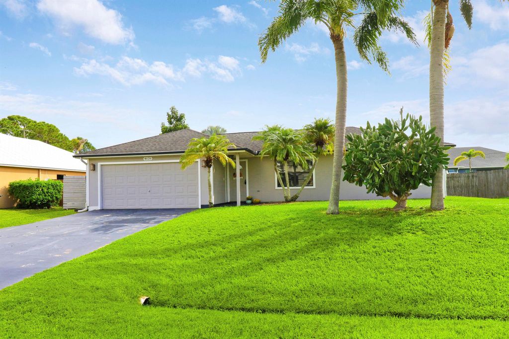 Photo of 4626 SW Fallkirk Street, Port St Lucie, FL 34953 (MLS # R10931422)