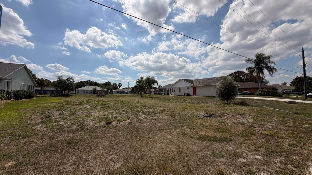 Photo of 2532 SW Monterrey Lane, Port Saint Lucie, FL 34953 (MLS # B26022388)