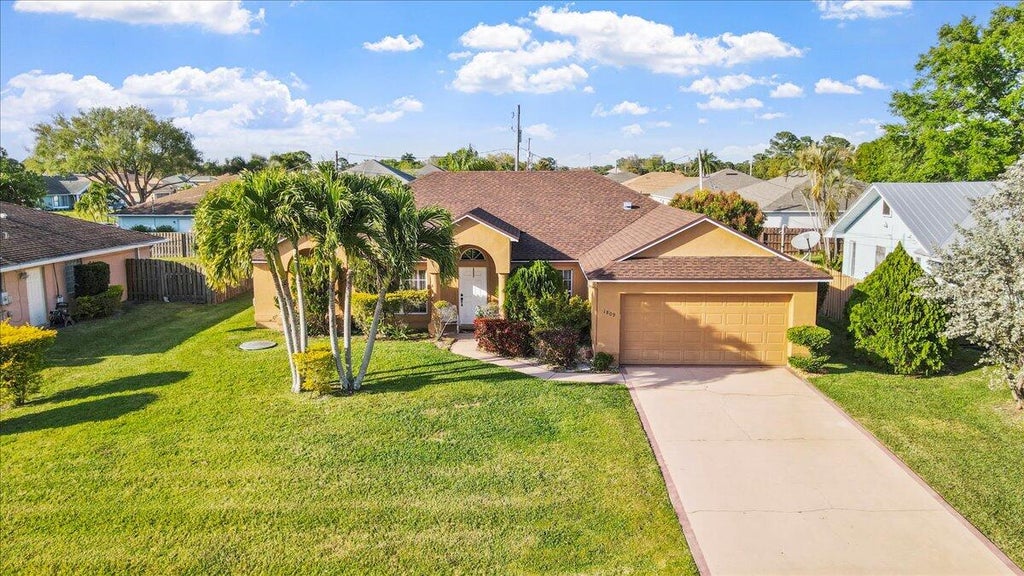 Photo of 1809 SW Millikin Avenue, Port Saint Lucie, FL 34953 (MLS # R10964348)