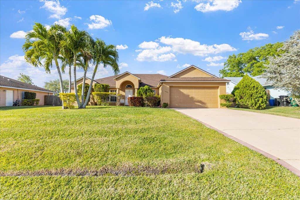 Photo of 1809 SW Millikin Avenue, Port Saint Lucie, FL 34953 (MLS # R10964348)