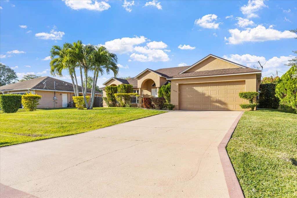 Photo of 1809 SW Millikin Avenue, Port Saint Lucie, FL 34953 (MLS # R10964348)