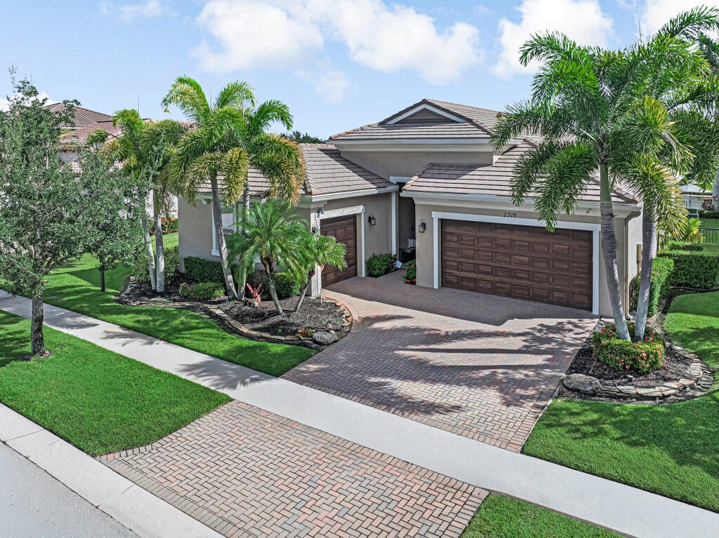 Photo of 2318 Bellarosa Circle, Royal Palm Beach, FL 33411 (MLS # B26071838)