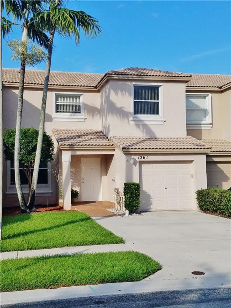 BACK ON THE MARKET! SHORT SALE OPPORTUNITY! Gorgeous and immaculate townhome in Park Crossing in the Towngate. Freshly painted, laminate floors throughout, stainless steel appliances, surround sound system, hurricane shutters, private fenced backyard with canal views and access. Community features 3 community pools, tots lots, basketball courts, baseball fields, beautiful landscaping. Basic cable included. Association approval is necessary.