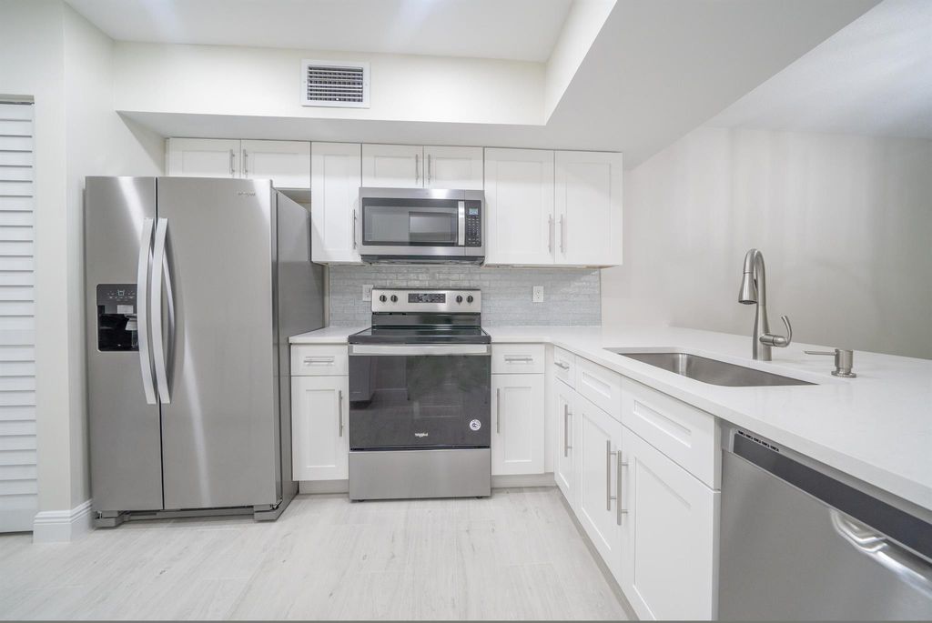 Photo of 208 Brackenwood Terrace, Palm Beach Gardens, FL 33418 (MLS # R11094724)