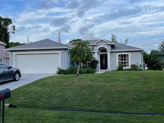 Photo of 4425 SW Farmington Street, Port Saint Lucie, FL 34953 (MLS # R10942920)