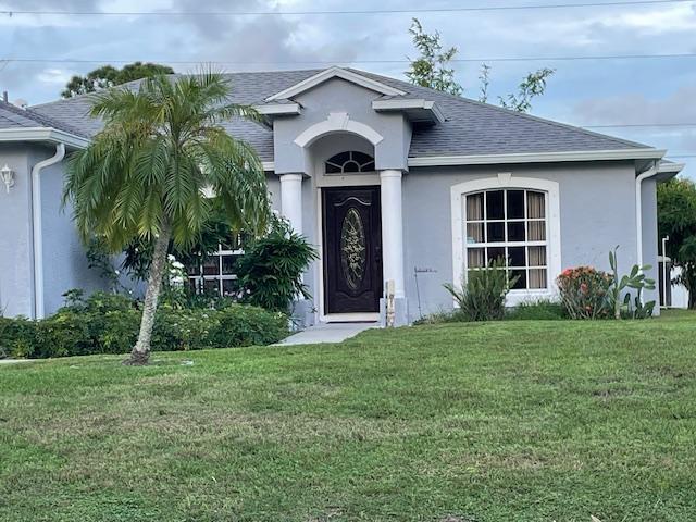 Photo of 4425 SW Farmington Street, Port Saint Lucie, FL 34953 (MLS # R10942920)