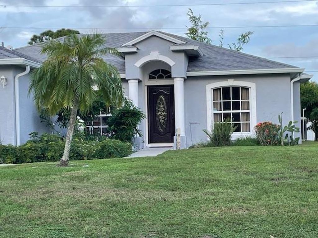 Photo of 4425 SW Farmington Street, Port Saint Lucie, FL 34953 (MLS # R10942920)