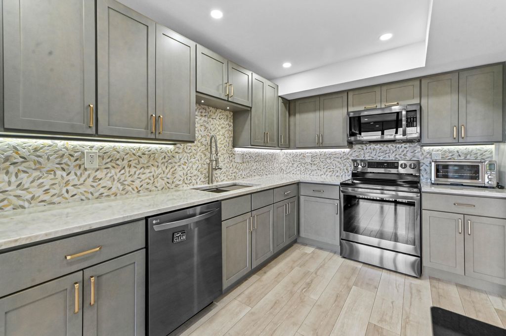 Photo of 5250 Woodland Lakes Drive #327, Palm Beach Gardens, FL 33418 (MLS # B26033741)