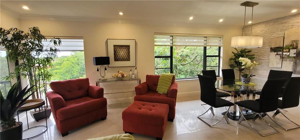Photo of 6010 S Falls Cir Drive #423, Lauderhill, FL 33319 (MLS # B26050335)