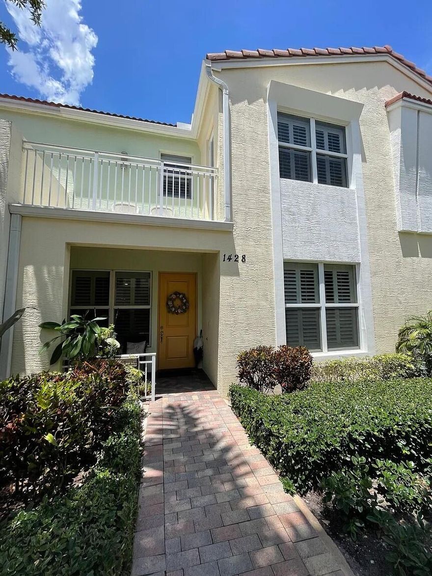 Step into effortless living in this beautifully maintained townhome in a prime Boca Raton location. The first level welcomes you with cool tile flooring that flows seamlessly into rich engineered hardwood up the stairs and continues through the spacious second-story loft and into every bedroom. Ceiling fans in every room keep the air breezy and comfortable, while classic plantation shutters add timeless charm and effortless privacy throughout. Two car garage with ample space for a workshop or additional storage complemented by an extended driveway that easily accommodates two additional vehicles — perfect for families and guests.  Unmatched Convenience Meets Natural Beauty  Tucked just west of I-95 at the Yamato exit, this hidden gem offers an unbeatable combination of modern convenience, comfort, and incredible location.  Daily essentials are right at your fingertips: vibrant shopping plazas, popular restaurants, and a Dunkin' Donuts are just across the street. The Tri-Rail train station** - with free parking for commuters, grocery stores, coffee shops, medical offices, and local employers are conveniently accessible.  Enjoy seamless connectivity — quick access to I-95, the Florida Turnpike, Town Center at Boca Raton, Florida Atlantic University, and Lynn University. Both Palm Beach International Airport and Fort Lauderdale-Hollywood International Airport are just 25-30 minutes away.  Best of all, this gated community backs directly onto a serene nature preserve anchored around Blue Lake with peaceful lake trails. A scenic path from the community leads straight to Spanish River Library, Spanish River Park, and Blue Lake Elementary — bringing nature, recreation, and top-rated education right to your doorstep.  **Tri-Rail Station - : Fort Lauderdale Airport Station  Tri-Rail Airport Shuttle: Complimentary shuttle bus service for Tri-Rail passengers between the Fort Lauderdale Airport Tri-Rail Station and the Fort Lauderdale/Hollywood International Airport (FLL)  Tri-Rail Station: Miami Airport Station   MIA Mover: Tri-Rail connects directly to Miami International Airport. The only connection needed is a short ride on the automated people mover (MIA Mover) between the Tri-Rail Station and Airport Terminals.  Discover the perfect blend of lock and leave convenience, comfort, and coastal Florida lifestyle in this exceptional Boca Raton retreat.
