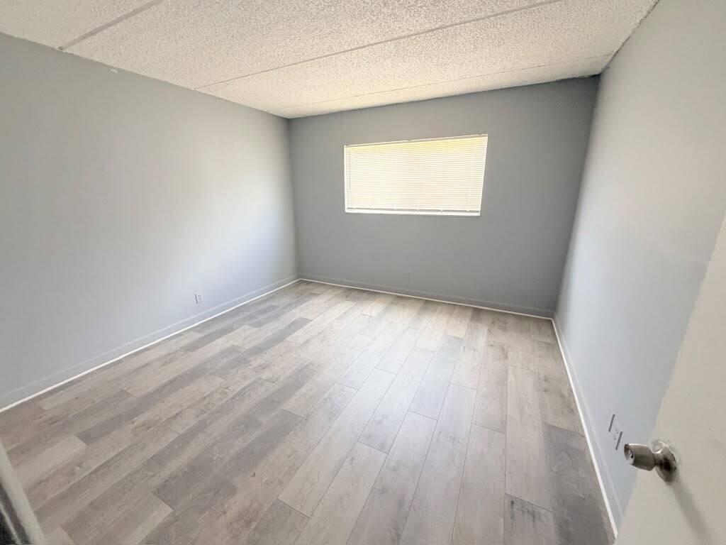 Photo of 1501 CRESCENT Circle #C19, Lake Park, FL 33403 (MLS # B26061666)