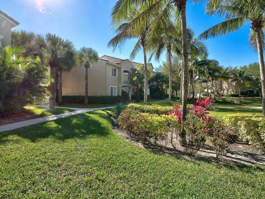 Welcome to your very own tropical oasis in the heart of Lighthouse Cove! This beautifully maintained first-floor condo offers the perfect blend of comfort, style, and convenience. With two spacious bedrooms and two full bathrooms, the thoughtfully designed split floor plan ensures both privacy and functionality--ideal for everyday living or hosting guests.Step inside to find warm wood flooring flowing through the main living areas, creating a welcoming and cohesive space filled with natural charm. The kitchen is tastefully updated with sleek quartz countertops, a newer refrigerator and dishwasher, and plenty of cabinet space--ready for you to whip up your favorite meals or entertain with ease.