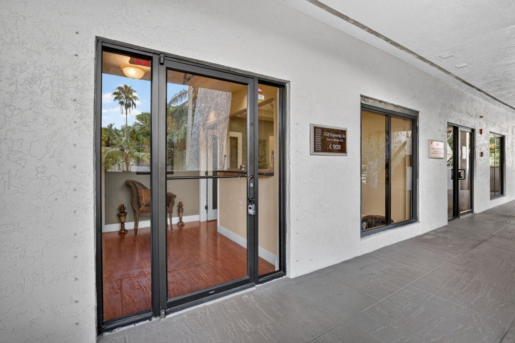 Photo of 2699 Stirling RD #C202, Hollywood, FL 33312 (MLS # B26046319)