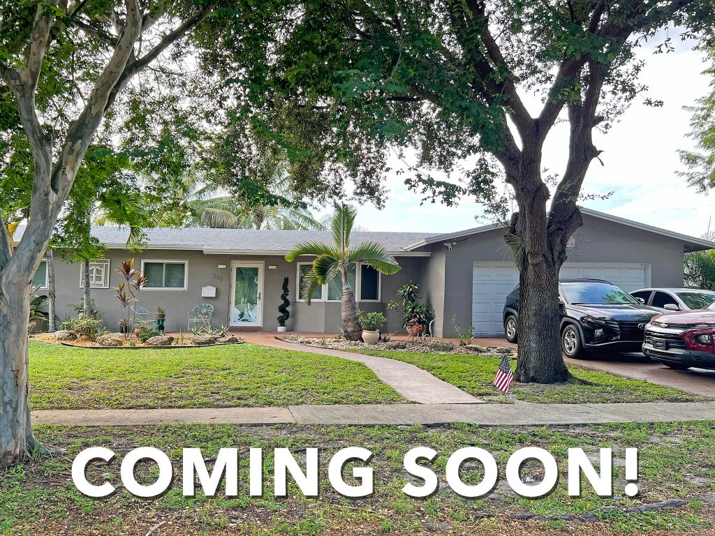 Photo of 291 Lake Drive, Coconut Creek, FL 33066 (MLS # B26067161)