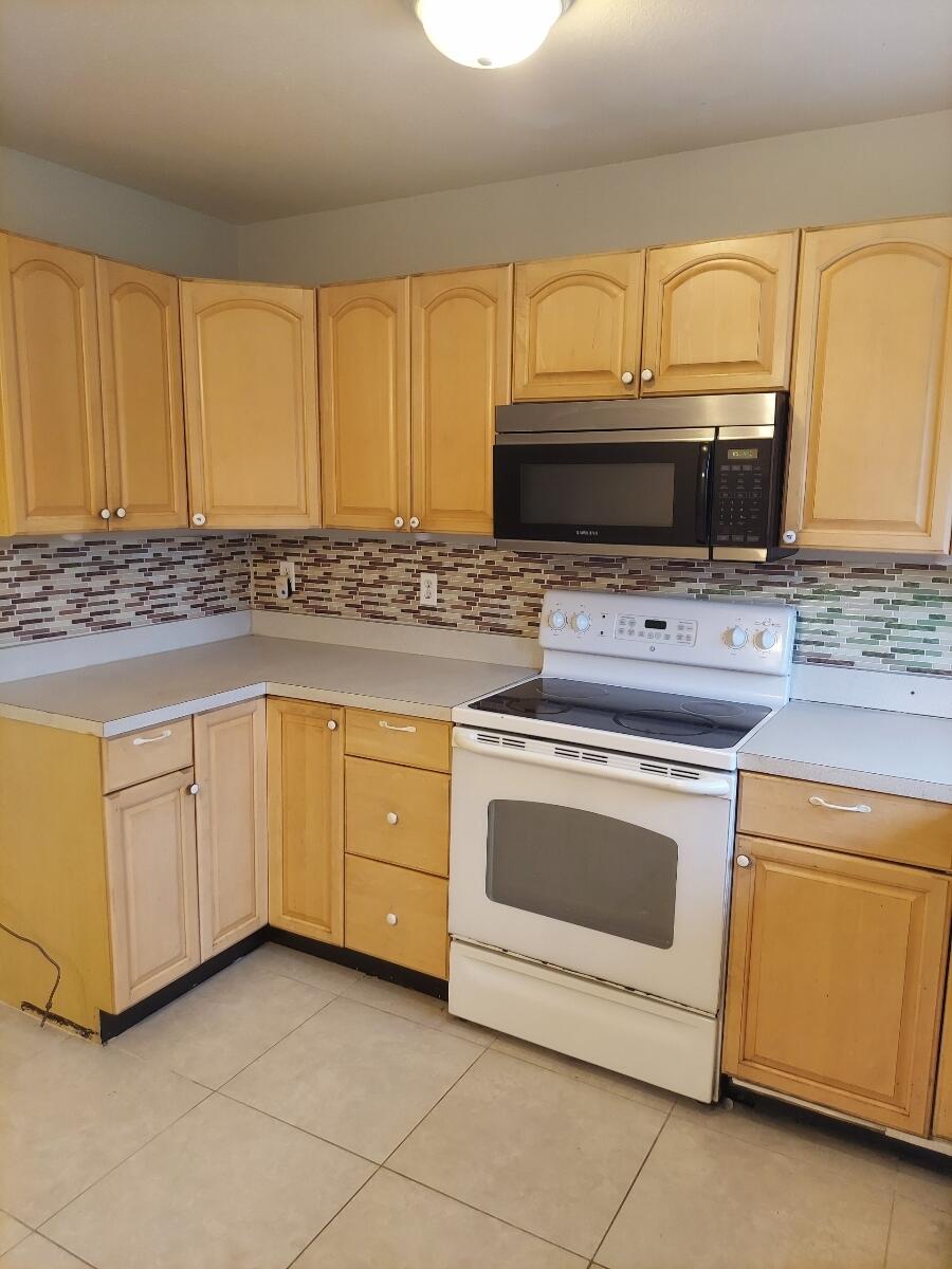 Photo of 2289 SE Seamist Street, Port Saint Lucie, FL 34952 (MLS # R11031289)