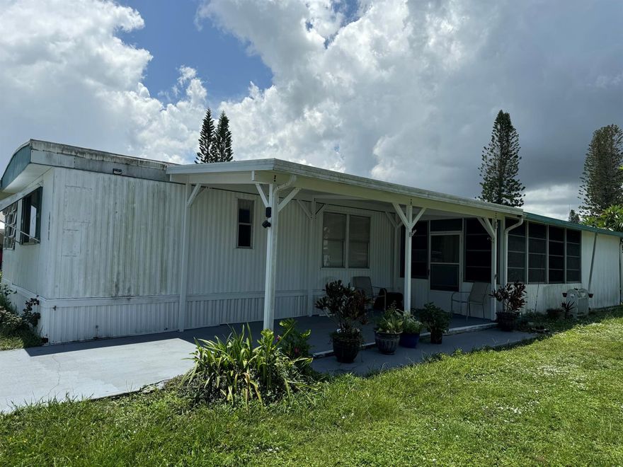 Fully furnished and turnkey home with 2 Bedrooms and 2 Baths, large florida room off of living room, screened in patio with attached shed that includes washer and dryer. Over 55 Community,  Owner will consider half down and half seller financing.  Call for private showing and lets make a deal!!!!