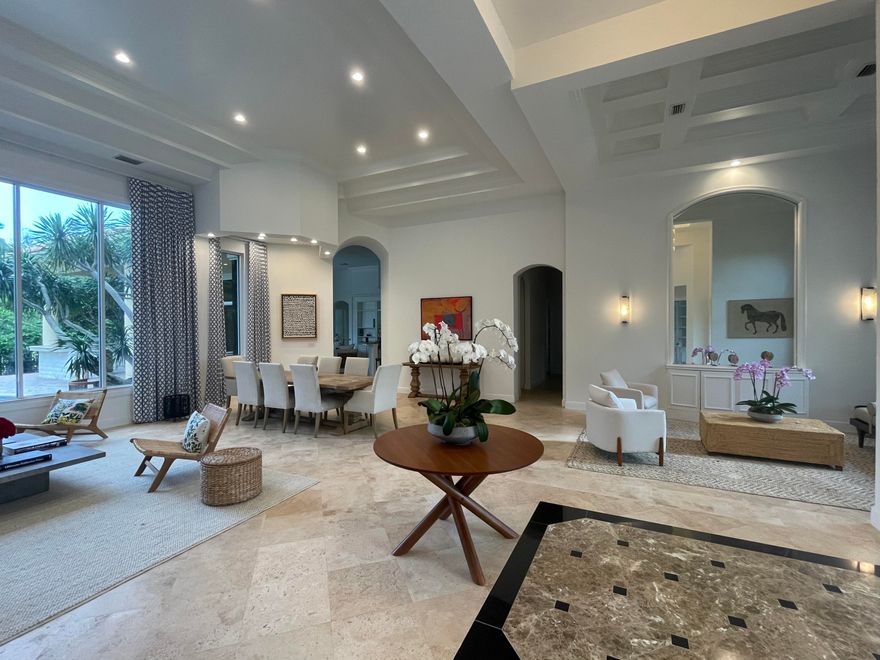 Rare opportunity to live in Wellingtons most sought after gated community ,The Equestrian Club Estates. Walk, bike ,golf cart to the Winter Equestrian Festival and Global dressage.This 4. bedroom 4 .5 bath home is situated on a private culdesac on Ambassador Dr. A Beautiful Split floor plan ,jack and Jill and en suite each bedroom has a private bathroom . The master bedroom is open and light with large his and hers walk in closets and spacious master bath..Private backyard with pool and and outdoor kitchen on the water front. Adjacent lot is included with this home with lush landscape and provides space, privacy and opportunity to expand.HOA covers both lots. lot PCN 73414420050000010