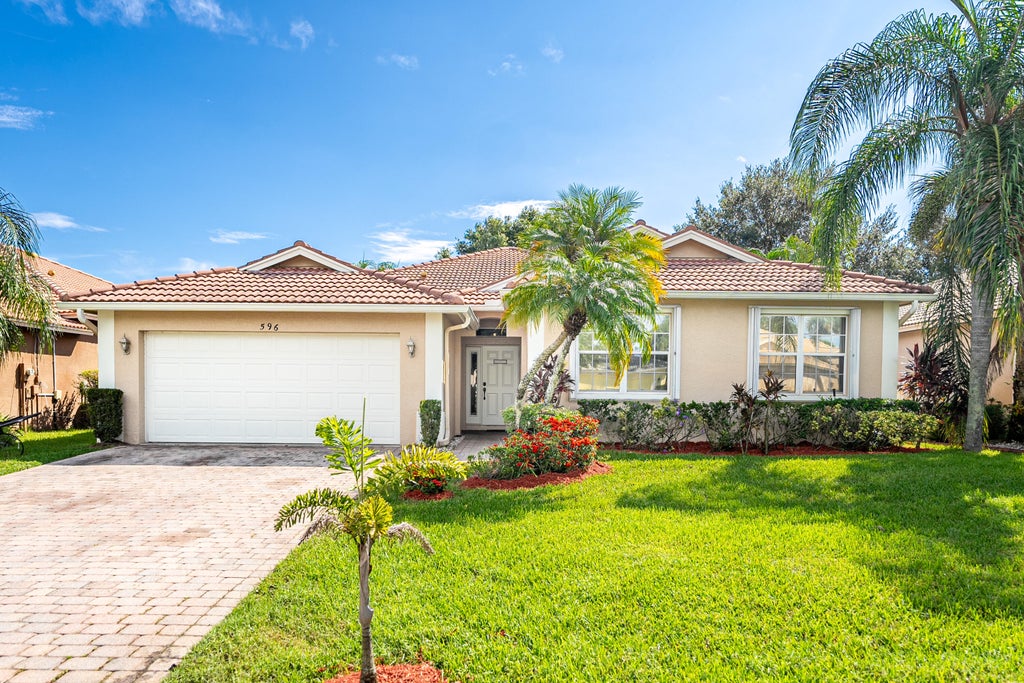 Photo of 596 NW Waverly Circle, Port Saint Lucie, FL 34983 (MLS # R11021543)
