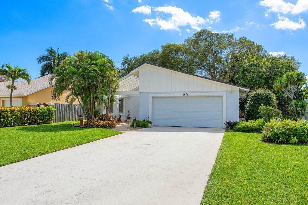 Photo of 1674 Woods Bnd, West Palm Beach, FL 33406 (MLS # R10970973)