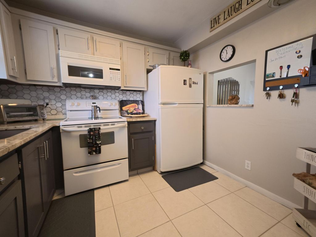 Photo of 4640 W Lucerne Lakes Blvd Blvd W #404, Lake Worth, FL 33467 (MLS # B26020568)