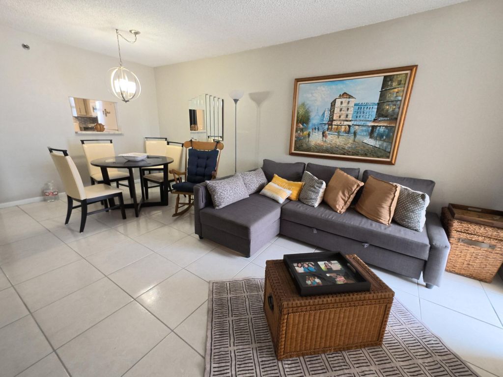 Photo of 4640 W Lucerne Lakes Blvd Blvd W #404, Lake Worth, FL 33467 (MLS # B26020568)