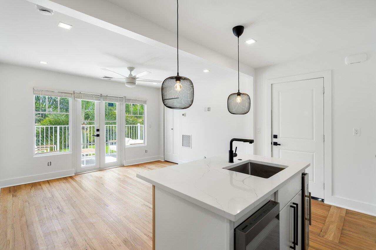 Discover Pineapple Grove Apartments, a charming 8-unit Spanish Revival building with lush tropical landscaping. Within it sits your dream one-bedroom apartment in the vibrant Pineapple Grove neighborhood of Delray Beach. This residence perfectly blends historic character and modern luxury. Inside you'll find real hardwood floors, central air, brand new appliances, an in-unit washer and dryer for your convenience, impact windows, french doors & much more. The bright inviting space is filled with natural light, and the thoughtfully designed layout ensures both comfort and ease. Just steps away from the eclectic mix of boutiques, art galleries and gourmet dining options in Pineapple Grove, you'll enjoy the best of Delray Beach living. Only first & security required with good income & credit.