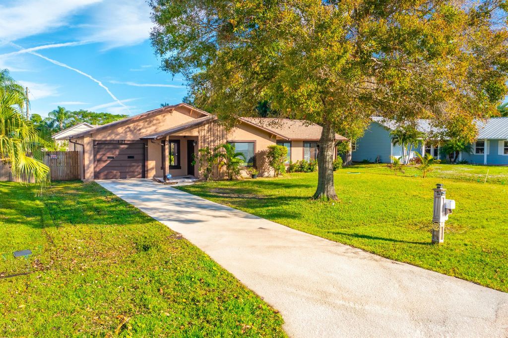 Photo of 121 SW Langfield Avenue, Port Saint Lucie, FL 34984 (MLS # R10946170)