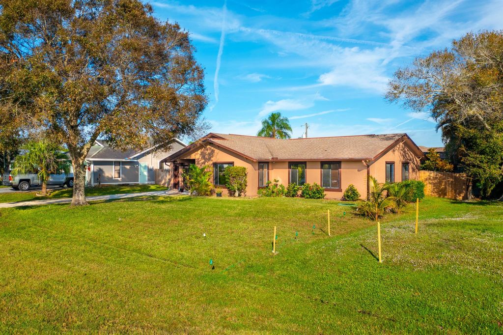 Photo of 121 SW Langfield Avenue, Port Saint Lucie, FL 34984 (MLS # R10946170)