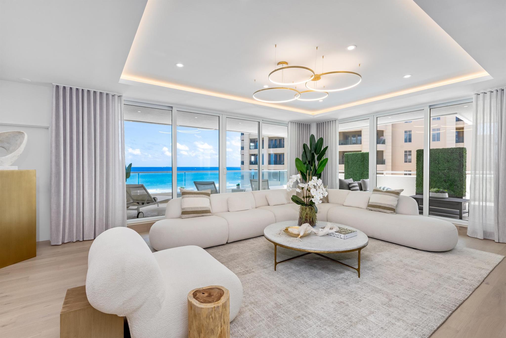 Introducing Residence C-5 at Aragon, Boca Raton's premier oceanfront address, where contemporary elegance meets refined coastal living. Masterfully re-envisioned by renowned designers Michael Gray and Lori Keezer, this immaculate residence offers a seamless blend of sophistication, comfort, and breathtaking ocean views. Encompassing 3,764 square feet of exquisitely designed interiors, the home showcases 3 spacious bedrooms and 3.5 impeccably appointed baths, each reflecting a balance of timeless design and modern sensibility.