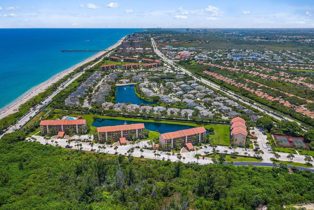 Photo of 101 Ocean Bluffs Boulevard #203, Jupiter, FL 33477 (MLS # R10998138)