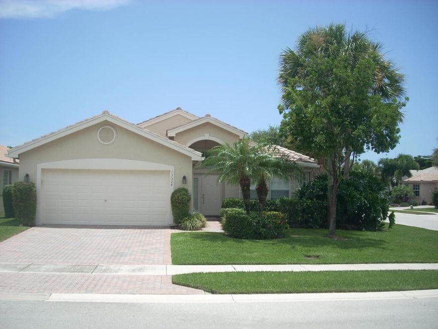 Enjoy the active lifestyle in the guard-gated, age-restricted, pet-friendly community.  Clubhouse has cafe, exercise facility, clubs, tennis, playground for kids, card rooms, pool & more.  Home is corner unit on a quiet street, one-story, with vaulted ceilings, open layout, three stacked bedrooms & screened patio.  Neutral colors, mostly tiled w/ carpet in bedrooms.  Master w/ Roman tub & separate step-in shower.  Convenient attached 2 car garage & side-by-side clothes washer & dryer inside home.  Near shopping, restaurants, public parks, close to 2 airports. Not far from beach & downtown Delray.