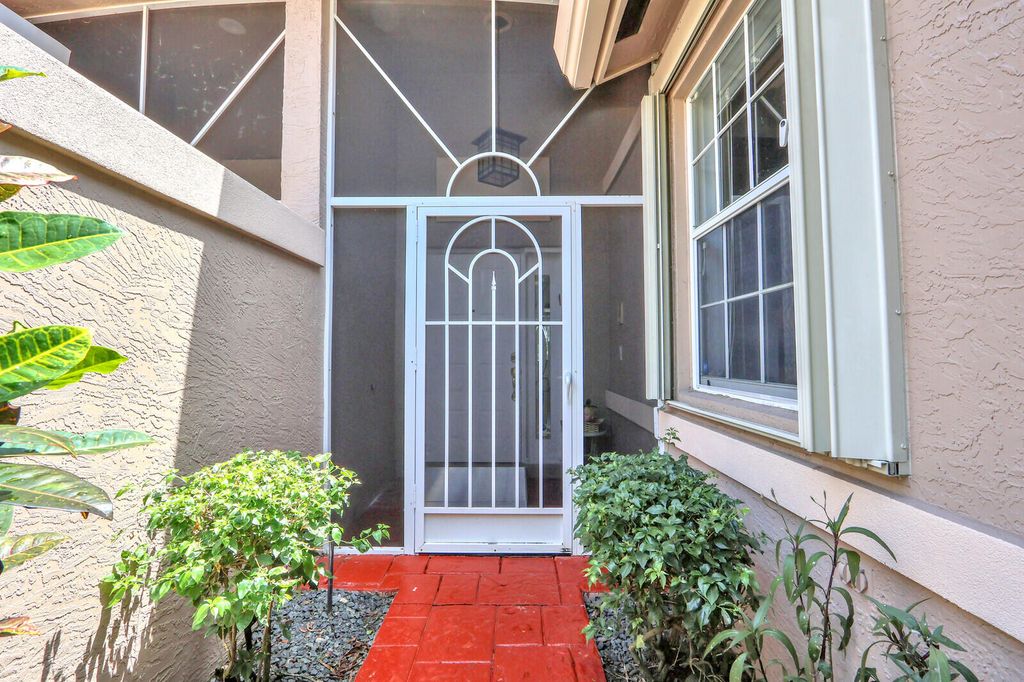 Photo of 9531 Crescent View Drive N, Boynton Beach, FL 33437 (MLS # B26020665)
