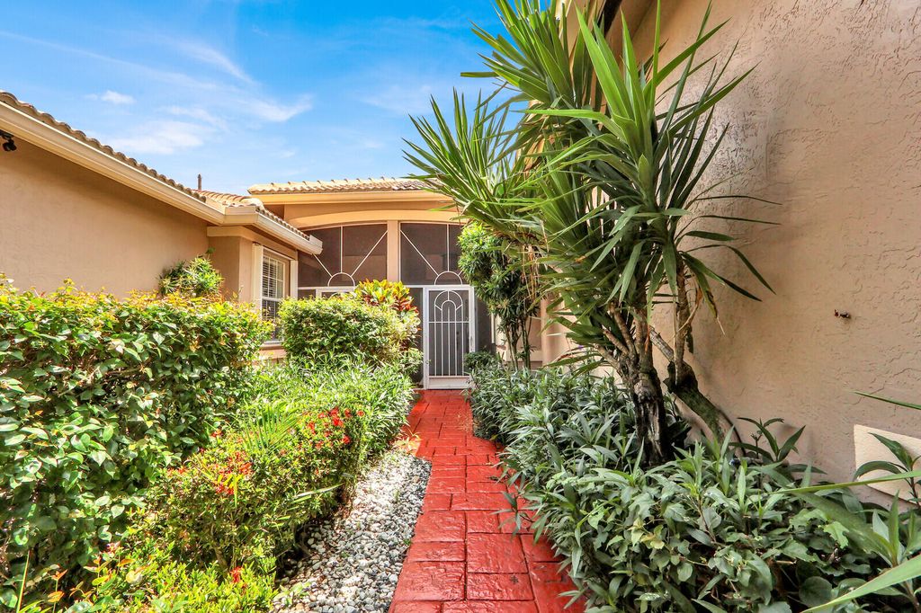 Photo of 9531 Crescent View Drive N, Boynton Beach, FL 33437 (MLS # B26020665)
