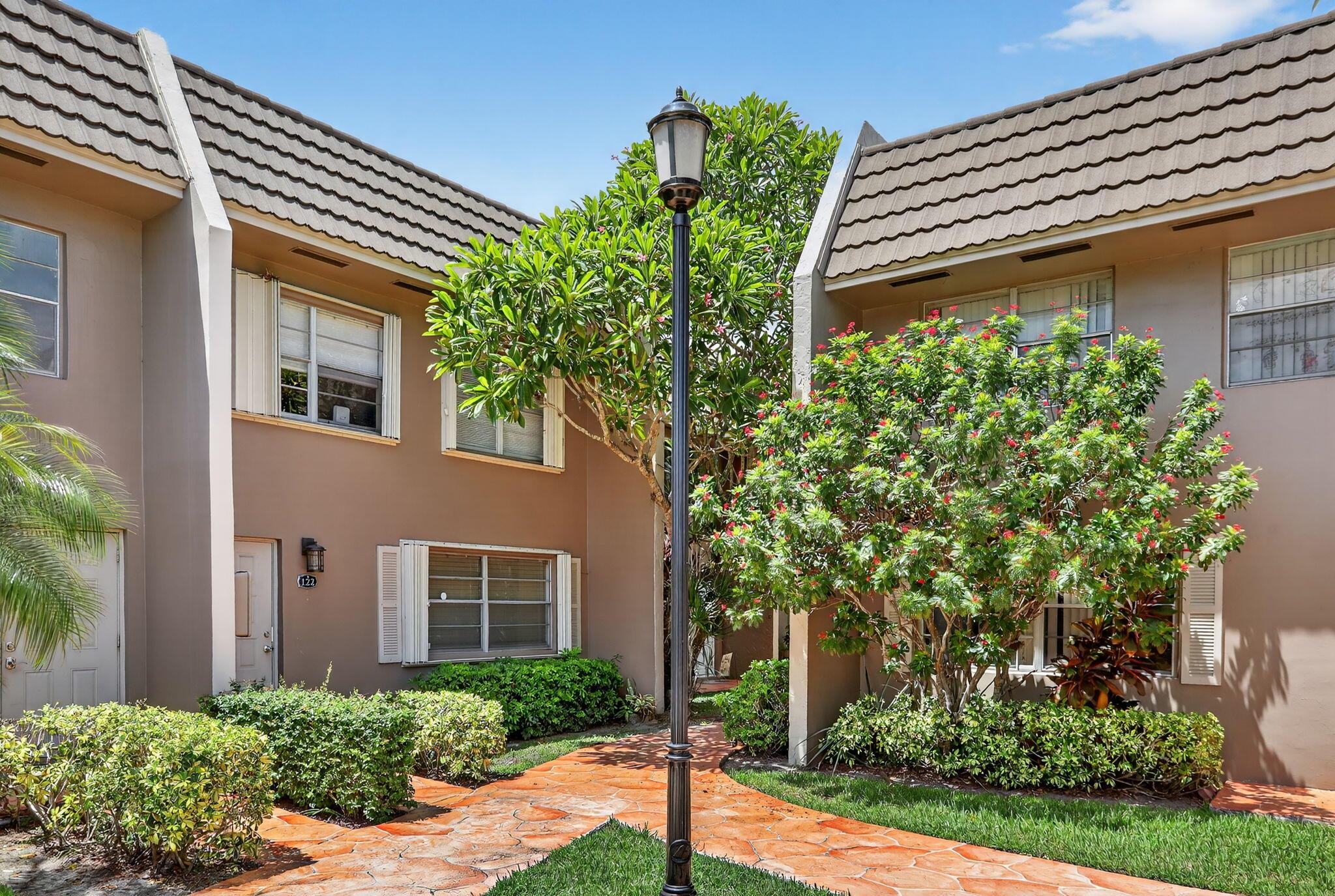 MOVE IN READY! Renovated 3-Bedroom, 2.5-Bathroom Townhouse in Coral Springs.This beautifully updated townhouse features new flooring, NEW carpeting on the stairs, and a 2023 roof. The kitchen boasts granite countertops, a built in water filtration system, and 2023 stainless steel appliances. The master suite includes a private balcony! Additional upgrades are 2024 AC, 2023 water heater, 2023 washer/dryer, and hurricane impact windows (2023). The screened-in porch overlooks a peaceful canal and grassy area, perfect for outdoor grilling. Community amenities include a private pool and hot tub, and HOA fee covers water. Located near A-rated schools, dining, shopping, and Coral Square Mall. 10% down & 650 credit score required. Schedule your showing today!