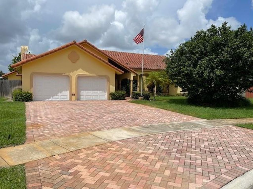 Photo of 1721 NW 96th Avenue, Plantation, FL 33322 (MLS # F10480445)